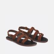 Sandalias planas de piel
